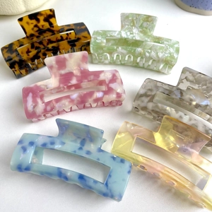 Set of 6 large acetate hair claws in various marble patterns and tortoiseshell finish