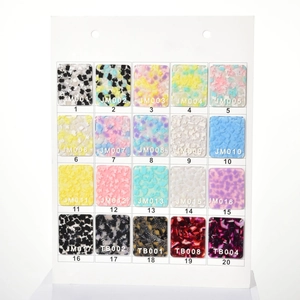 Detailed catalog of 20 acetate hair claw material swatches with diverse marble patterns