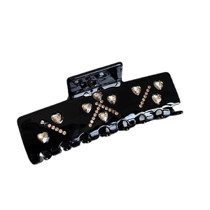 Elegant black acetate rectangular hair claw clip with heart shaped champagne rhinestones
