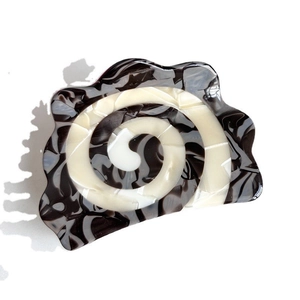 Retro minimalist acetate claw clip with black and white marble spiral pattern