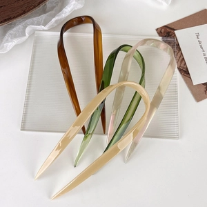 Minimalist U-shaped hair pins in amber, emerald, beige and pearl white resin finishes