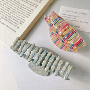 Chic acetate hair claws in leopard spot and colorful stripe patterns for women
