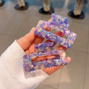 Rectangle acetate marble hair claw clip in purple and blue tones for thick hair