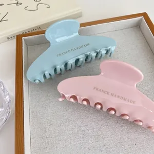 Large acetate hair claws in pastel blue and pink with France Handmade gold lettering