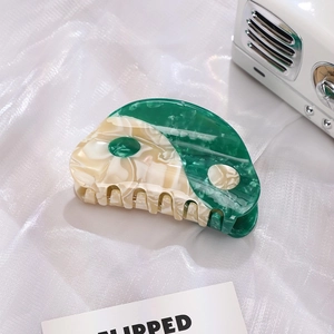 Acetate hair claw clip with green and white marble Yin Yang Tai Chi design for women
