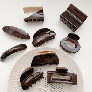 Brown and cream acetate hair claw clip set for women with vintage minimalist design