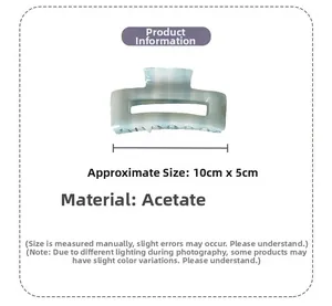 Detail view of square marble pattern acetate hair claw clip with 10cm by 5cm dimensions