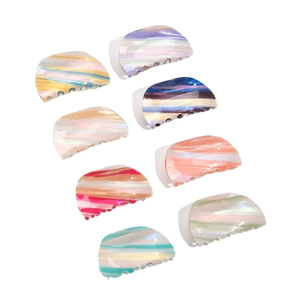 Set of 8 colorful striped acetate hair claws in various marble patterns for women