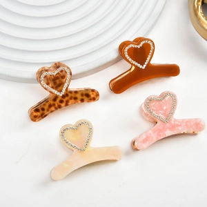 Lot de 4 pinces à cheveux en acétate en forme de cœur avec strass et motifs marbrés