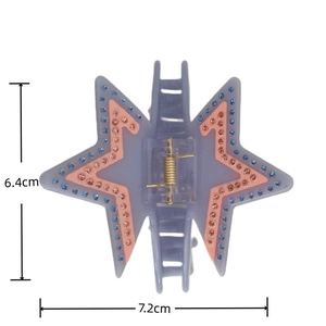 Détail montrant les dimensions 7,2 cm x 6,4 cm pour la pince à cheveux étoile