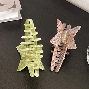 Pinces à cheveux papillon en acétate avec motifs marbre vert et écaille de tortue