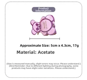 Détail d'une pince à cheveux ours violette en acétate avec dimensions de 5 cm