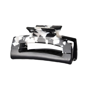 Rectangle marble pattern hair claw clip with cutout design and silver metal spring