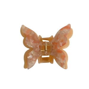 Double butterfly acetate hair claw clip with orange white marble pattern and gold spring