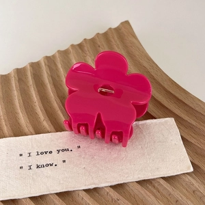 Vibrant rose pink acetate flower claw clip for elegant women hair styling