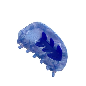 Pince à cheveux en acétate bleu avec relief floral pour coiffure élégante