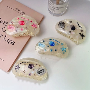 Colorful ocean theme hair claws set with shell texture and starfish crystal accents
