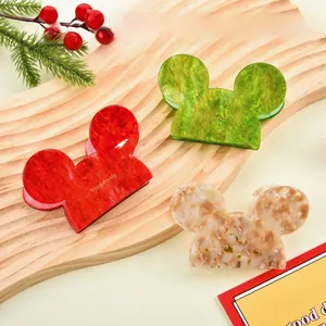Christmas Mickey mouse shaped acetate hair clips in red green and beige marble patterns