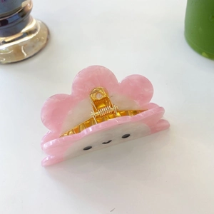 Pince à cheveux nuage en acétate rose avec visage souriant de tournesol et ressort doré
