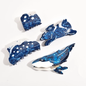 Barrettes à cheveux en acétate bleu foncé avec texture marbrée et accents étoilés