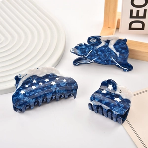 Set de pinces à cheveux en acétate bleu foncé avec étoiles blanches et ours polaire
