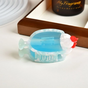 Blue cream soda inspired acetate hair claw clip with red bow accents for women