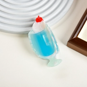 Blue cream soda inspired hair claw clip with cherry accent for summer styling
