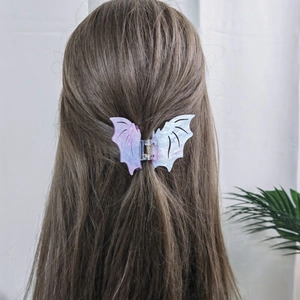 Pince à cheveux en acétate en forme d'aile de chauve-souris avec motif marbré violet