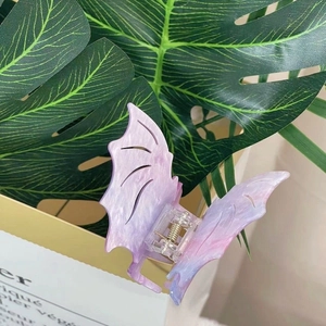 Pince à cheveux chauve-souris en acétate marbré coloré avec dégradé de violet