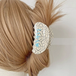 Elegant semi-round acetate hair claw clip with purple marble pattern and Little text