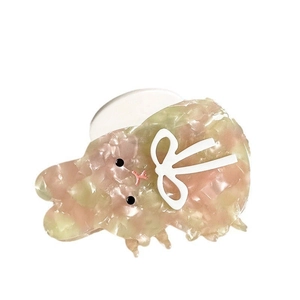 Pince à cheveux mignonne en acétate motif marbre rose et vert avec nœud blanc