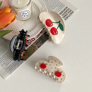Elegant acetate hair claws with cherry and apple rhinestone patterns in a premium set