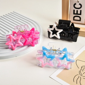Y2K star hair claws in vibrant pink, black-white, and blue-pink gradient resin
