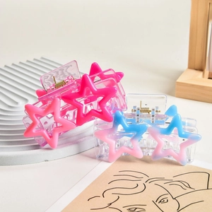 Y2K star-shaped hair claws in vibrant gradient pink and blue with durable metal spring