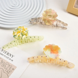 Three-piece acetate shell claw clips with sparkling rhinestones in assorted colors