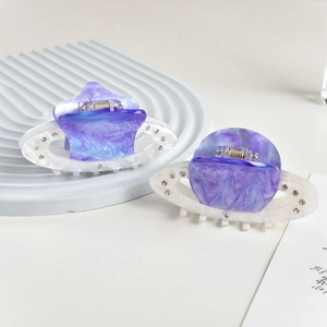 Star and planet acetate hair claws with marble purple nebula pattern and rhinestones