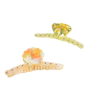 Acetate shell hair claw clips with colorful rhinestones in light green and orange-pink