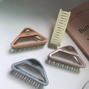 Set of 4 macaroon color triangle hair claws in rose pink, cream yellow, and purple