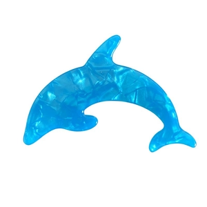 Blue dolphin hair clip with marbled acetate pattern shown from a top-down view