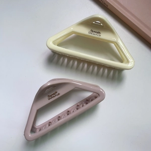 Minimalist macaron triangle shark clips in cream white and lotus pink resin finish