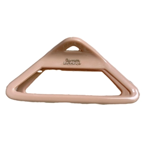 Matte nude pink triangle shark hair clip with Barrette La France text on white background