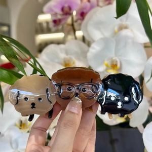 Three cute acetate dog hair claws in beige, brown and black for women hairstyles