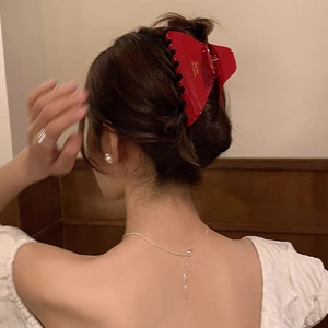 French style large red hair claw clip for thick hair with gold lettering detail