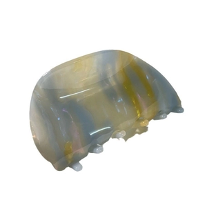 Iridescent acetate shell claw clip with marble grey and yellow texture for hair styling