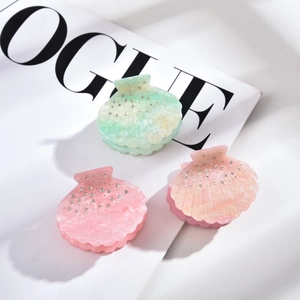 Mollette per capelli a conchiglia con strass in acetato marmorizzato verde e rosa