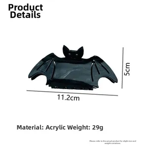 Detailed view of black bat hair claw clip showing size dimensions of 11.2cm x 5cm
