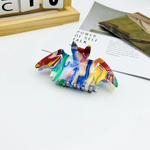Colorful bat-shaped acetate hair claw clip with marble texture for Halloween hairstyles