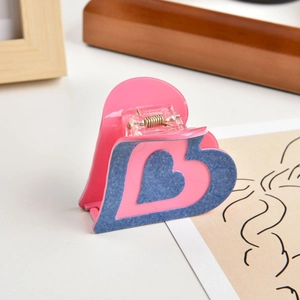 Pink heart hair claw clip with blue denim texture and gold metal spring for women