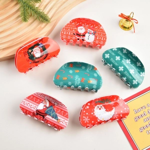 Set di mollette per capelli natalizie con motivi Babbo Natale e pupazzo di neve colorati