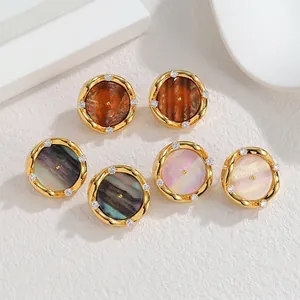 Vintage gold round stud earrings with shimmering shell inlay and zircon accents
